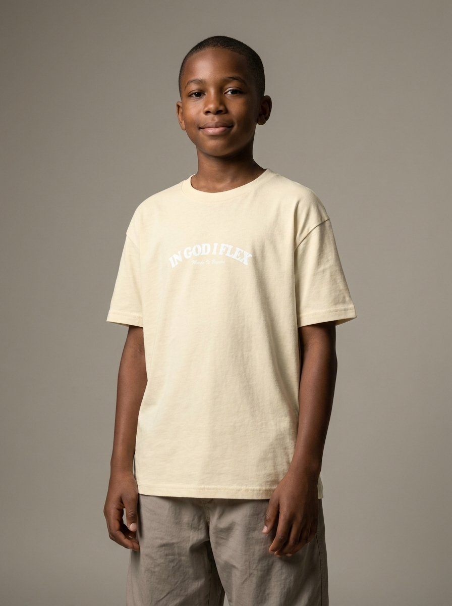 Youth model wearing natural cream IGIF t-shirt